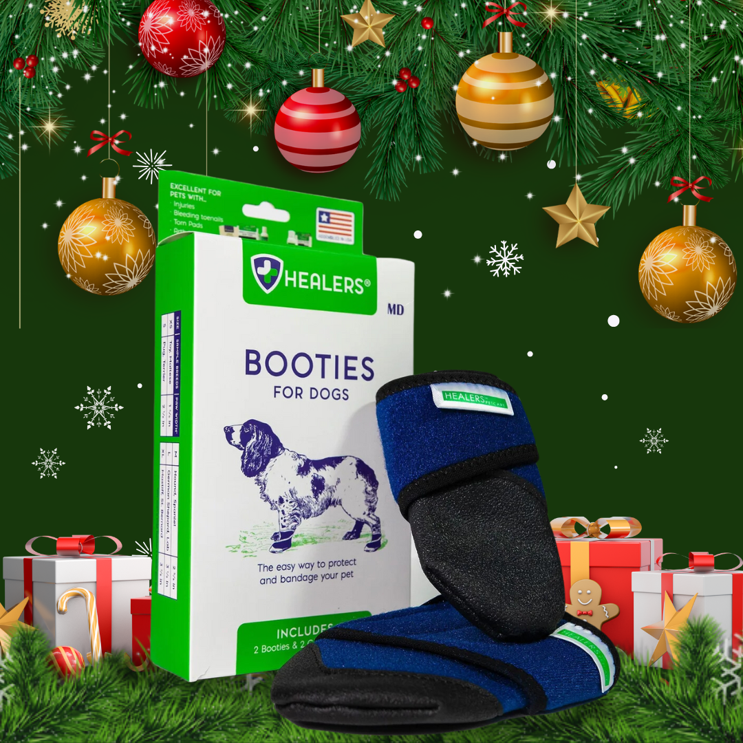 Healers Booties for dogs with packaging and boots displayed amid Christmas decorations and gift boxes, promoting pet paw protection as a holiday gift