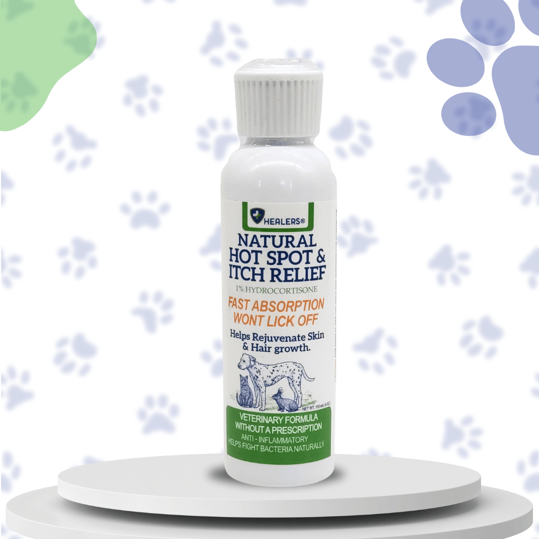 White bottle of Healers Natural Hot Spot & Itch Relief with green label. Text highlights fast absorption, no lick off, skin rejuvenation. Veterinary formula, anti-inflammatory, anti-fungal. Light background with blue & green paw prints.