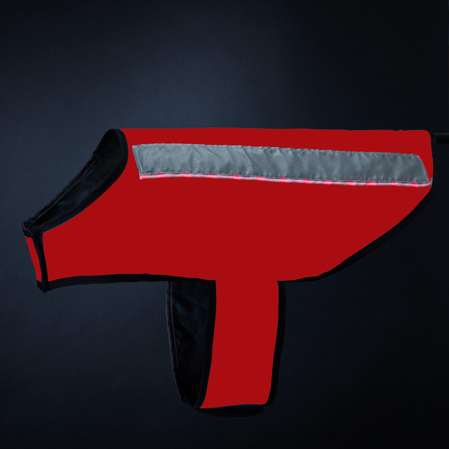 This red reflective dog jacket provides enhanced visibility and safety in low-light environments. Designed for comfort and durability, it features a snug fit with bold contrast trim and a reflective strip along the back—perfect for walks any time of day.