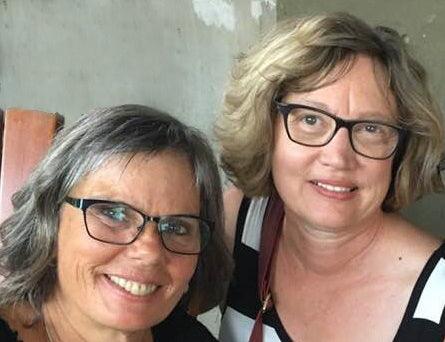 Healers PetCare founder Terri Entler with Biolley Farms owner Jennifer Long, celebrating their partnership to create organic Golden Turmeric Paste for Dogs